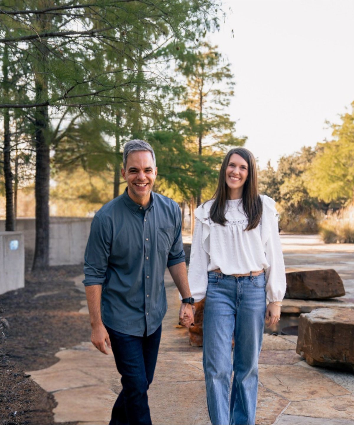 Liz and Kyle walking together outdoors